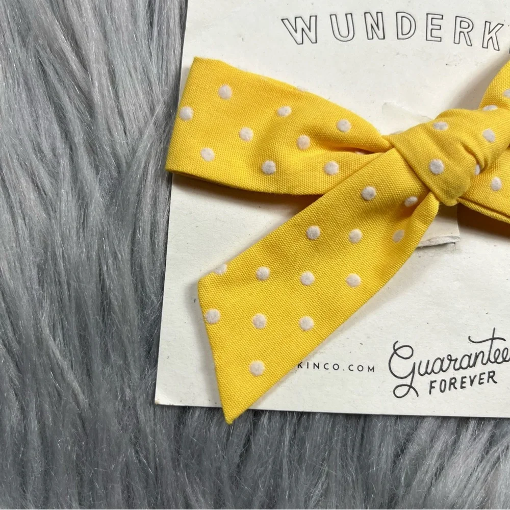 Wunderkin yellow Swiss dot bow clip